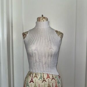 White Ribbed Sleeveless Turtleneck Knit Top – Asymmetrical Hem